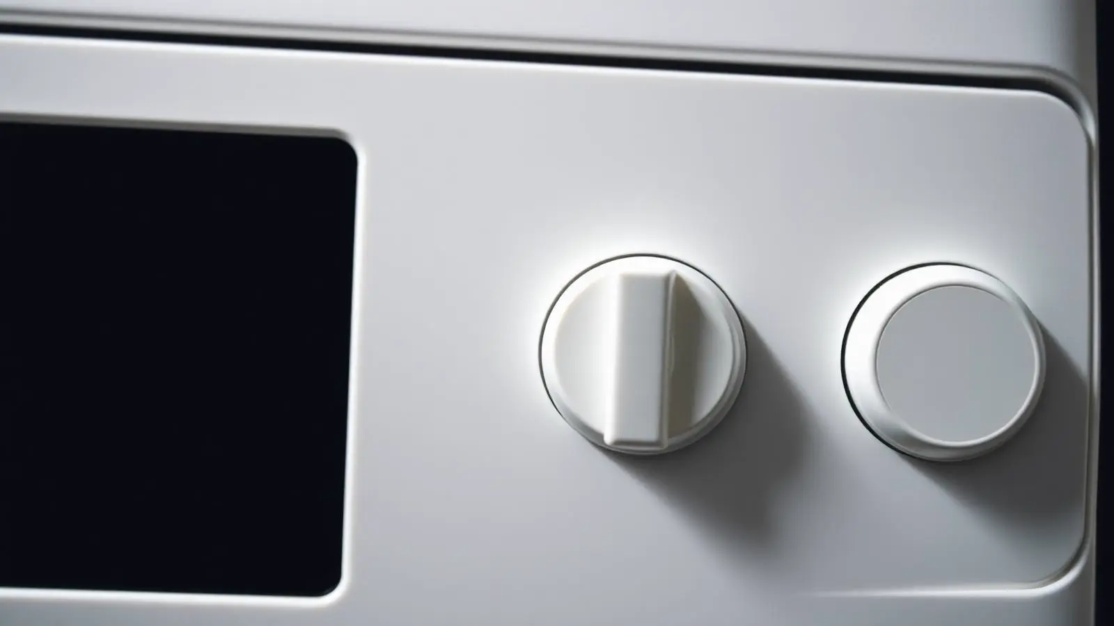 Close view of the electronic control panel on an electric water heater with its status light lit